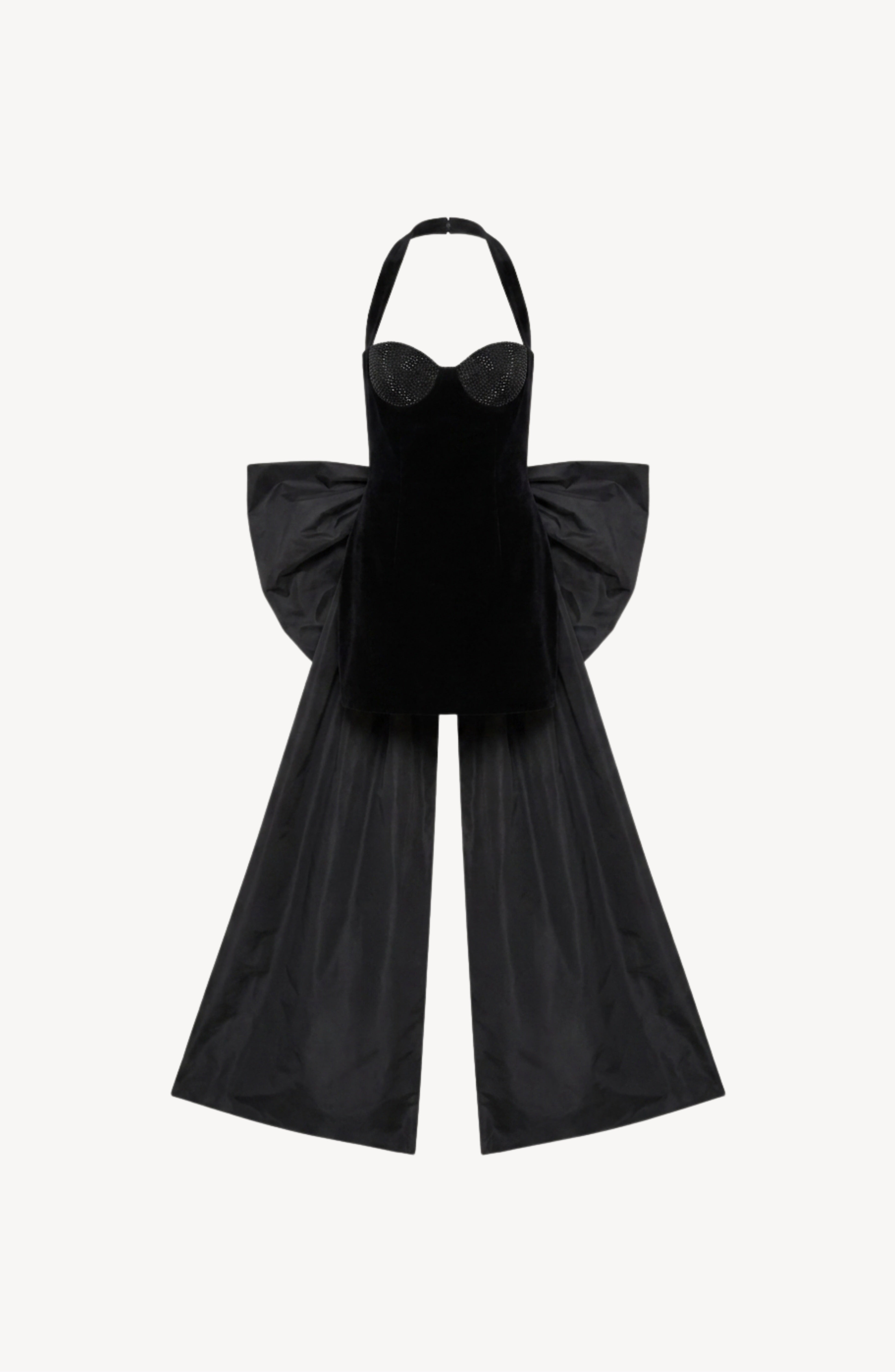 Displayed against a white background is the LOULOU Velvet Bow Mini Dress, crafted from black velvet with a fitted bodice and dramatic wing-like side panels—echoing the elegance of a halter-neck jumpsuit with wide-leg flair.