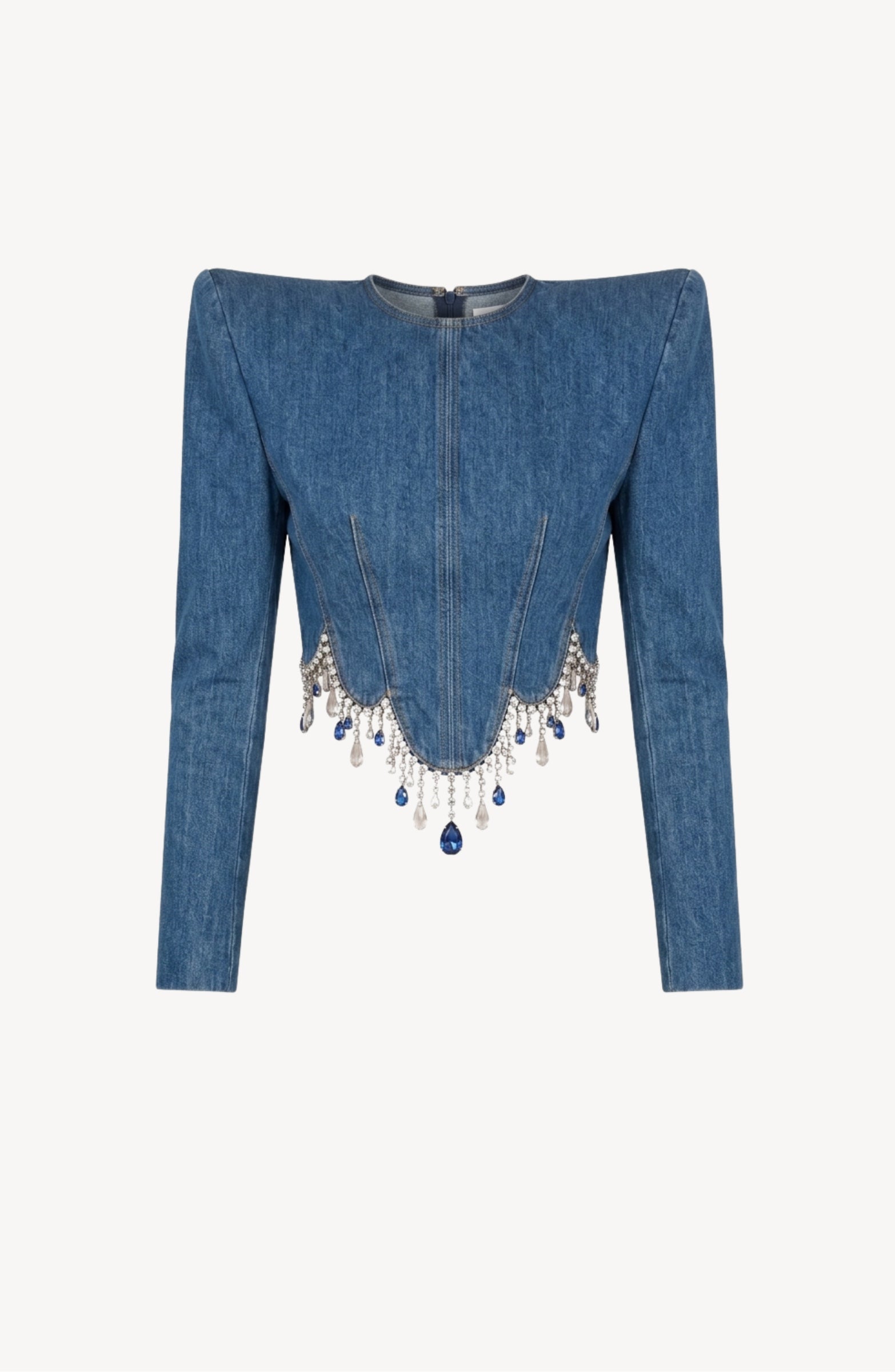 Introducing the LOULOU Crystal Fringe Denim Top: a structured denim jacket with long sleeves and a pointed shoulder silhouette, showcasing a sculpted panelled body and adorned with blue and silver crystal fringe along the bottom hem.