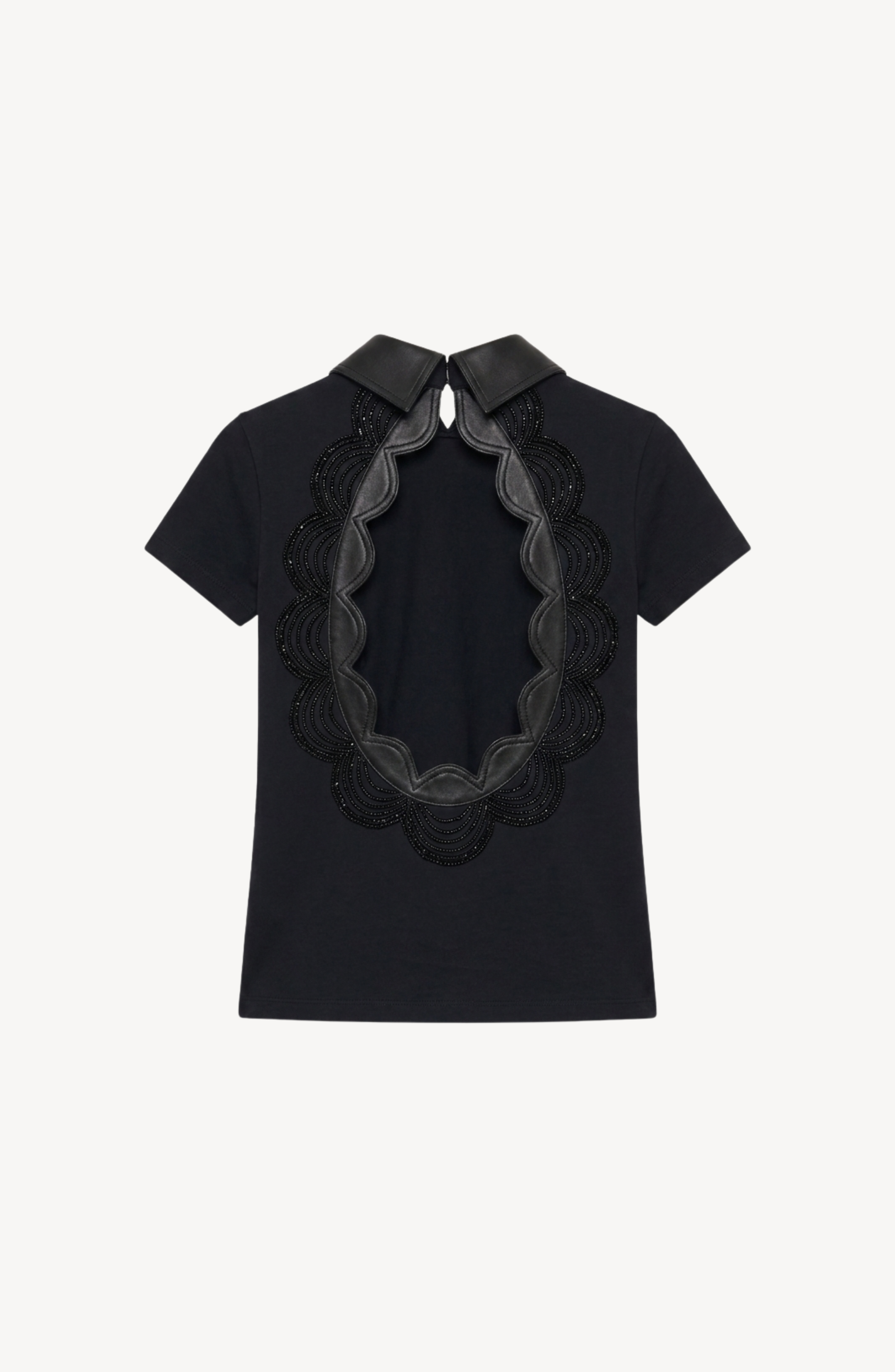The Scalloped Open Back Top by LOULOU is a black cotton blend fitted top with short sleeves, showcasing a dramatic oval-shaped open back edged in scalloped black lace and finished with a sleek leather collar at the neckline, secured with a button fastening.