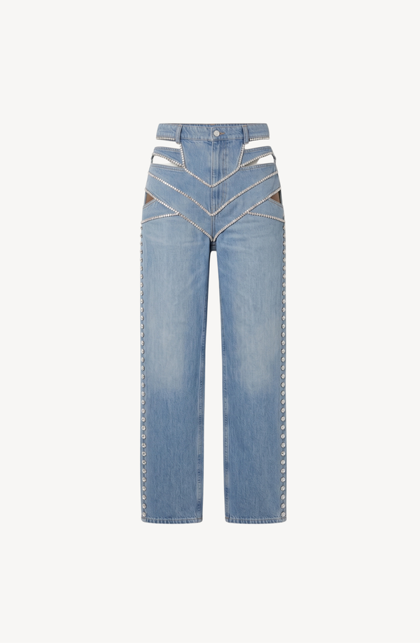 The LOULOU Runaway Jeans feature a light blue faded wash, high-waisted wide-leg fit, hip and thigh cutouts, silver grommet seams, and bold deconstructed styling for an edgy look.