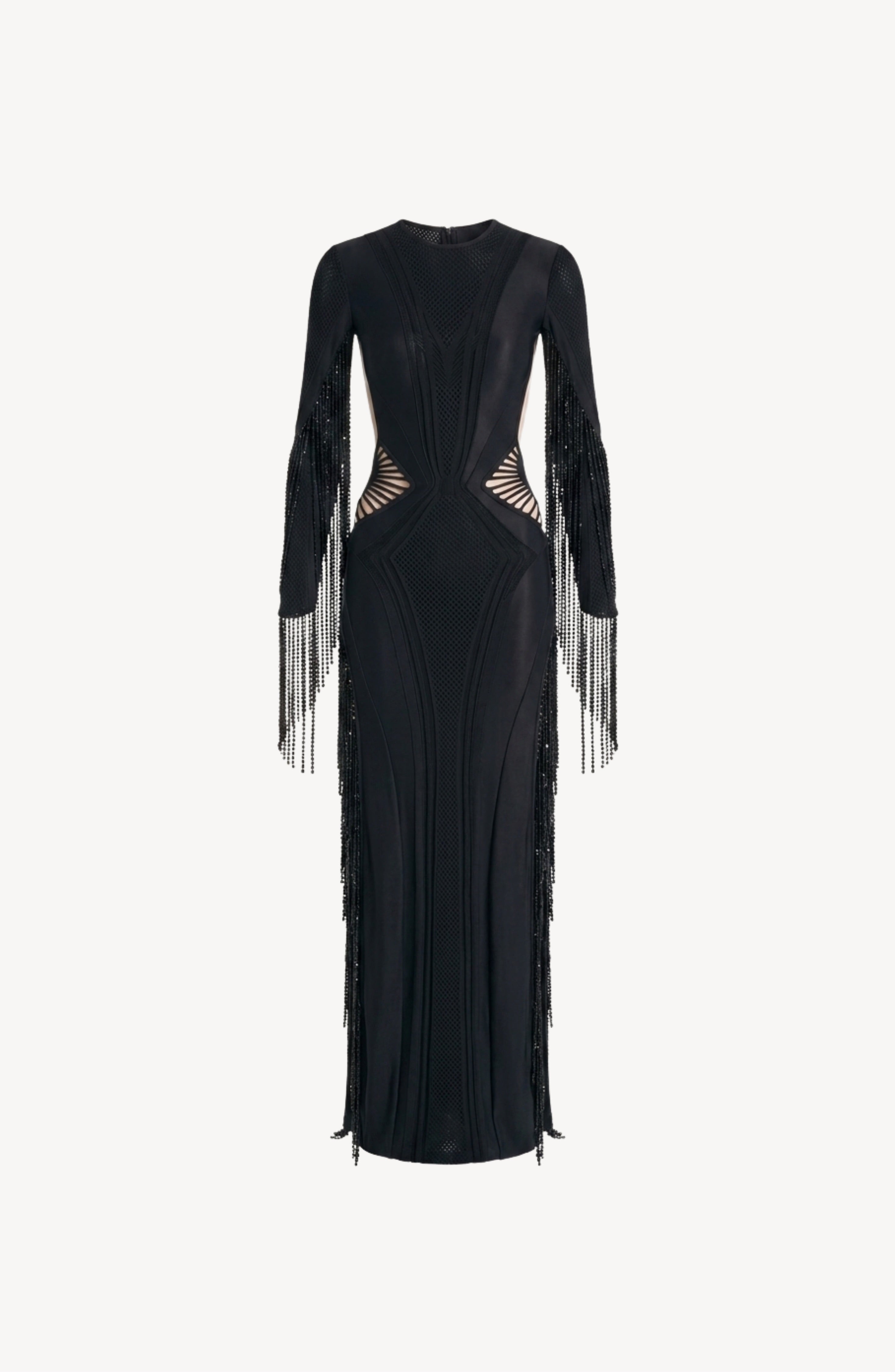 The Beaded Fringe Cut-Out Gown by LOULOU is a jet black, floor-length maxi with a fitted silhouette, showcasing geometric paneling and bold waist cutouts. Long sleeves embellished with beaded fringe add elegant detail, and the gown is displayed against a plain white background.