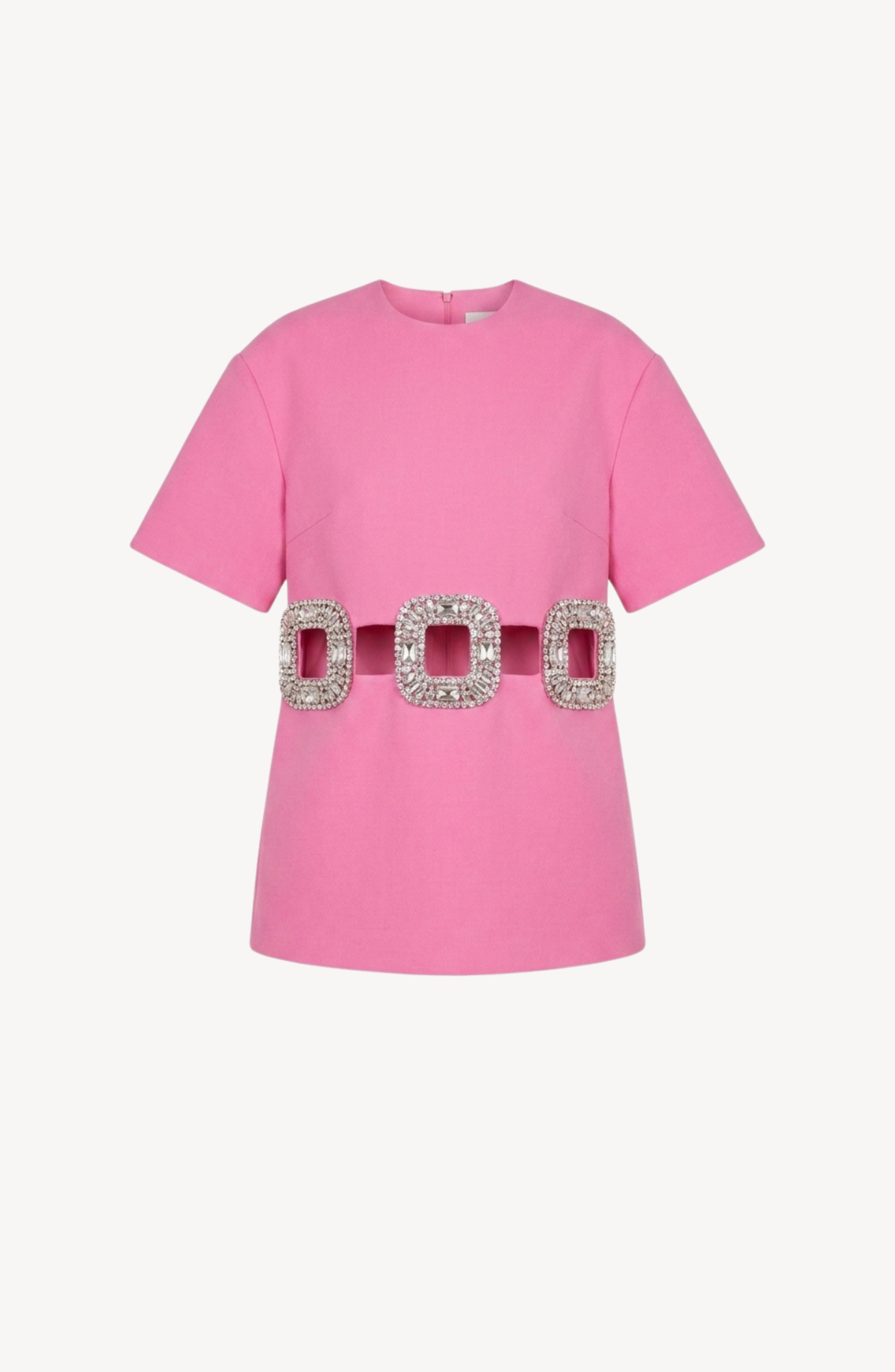 The LOULOU Crystal Buckle Cut-Out Top is a short-sleeved fuchsia crepe design featuring three large, square, crystal-embellished buckles across the waist and subtle cut-out details at the waist, shown against a plain white background.