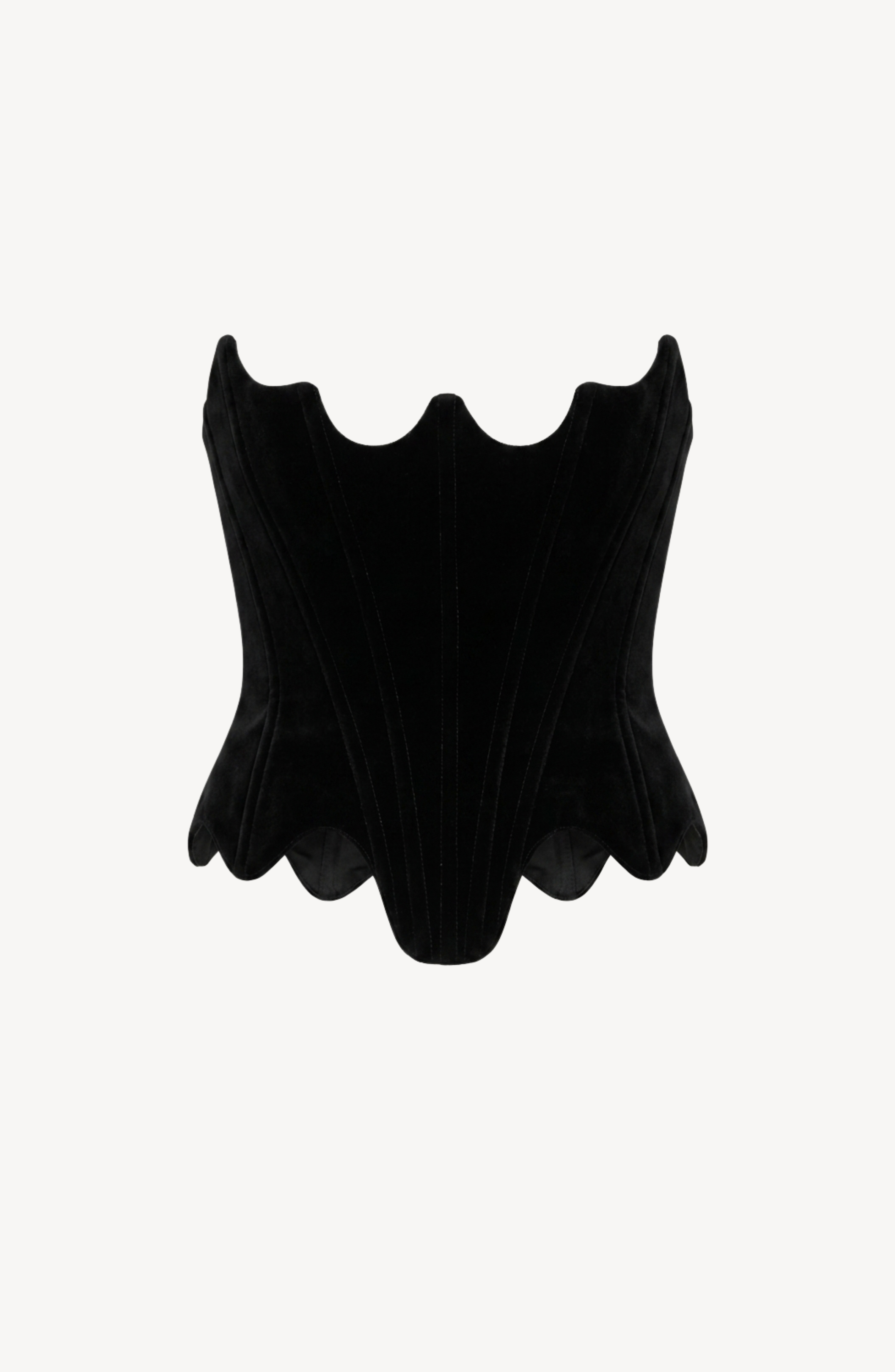 The LOULOU Velvet Architectural Corset is displayed against a plain white background, showcasing its black velvet fabric, structured sculpted silhouette, and distinctive architectural neckline with pointed, wavy edges along the top and bottom.