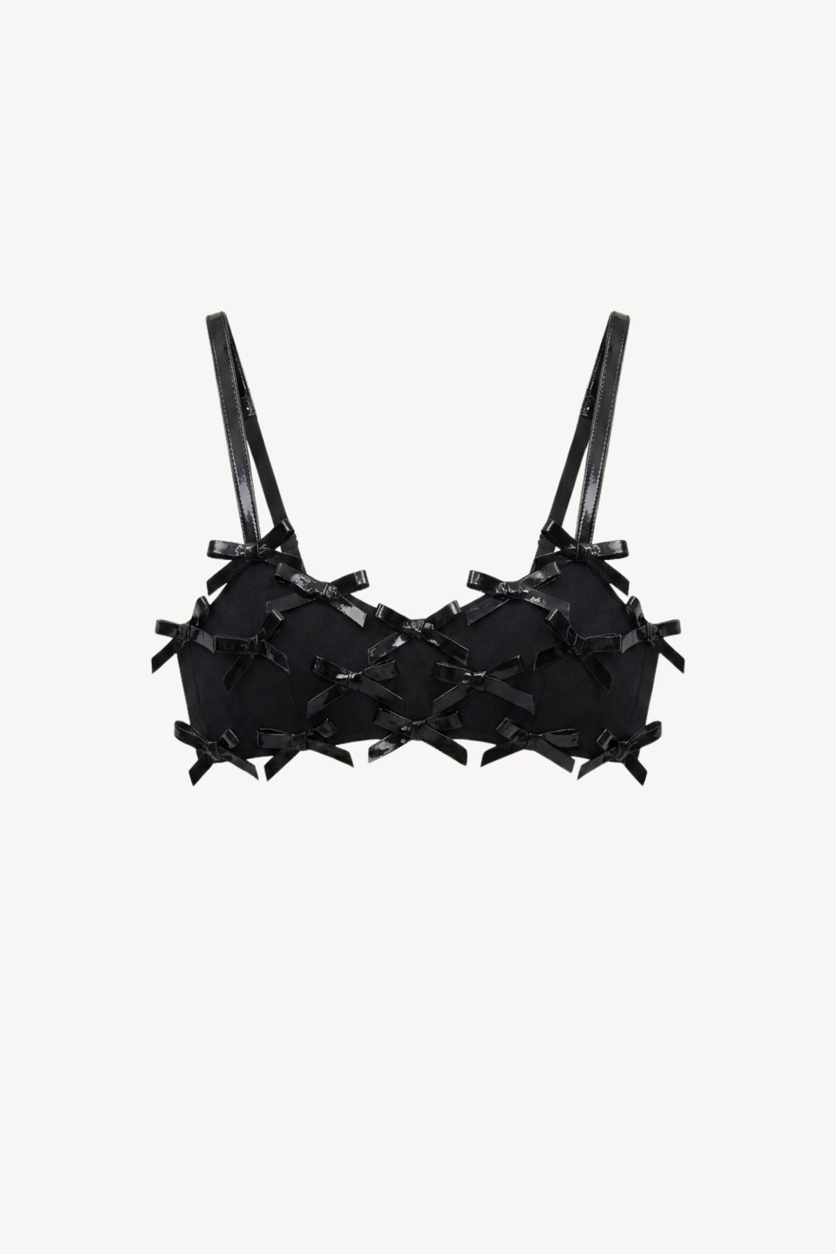LOULOU's Black Bow Appliqué Bralette Top features adjustable straps, a structured silhouette, and multiple shiny black bows across the cups and front, shown against a plain white background.