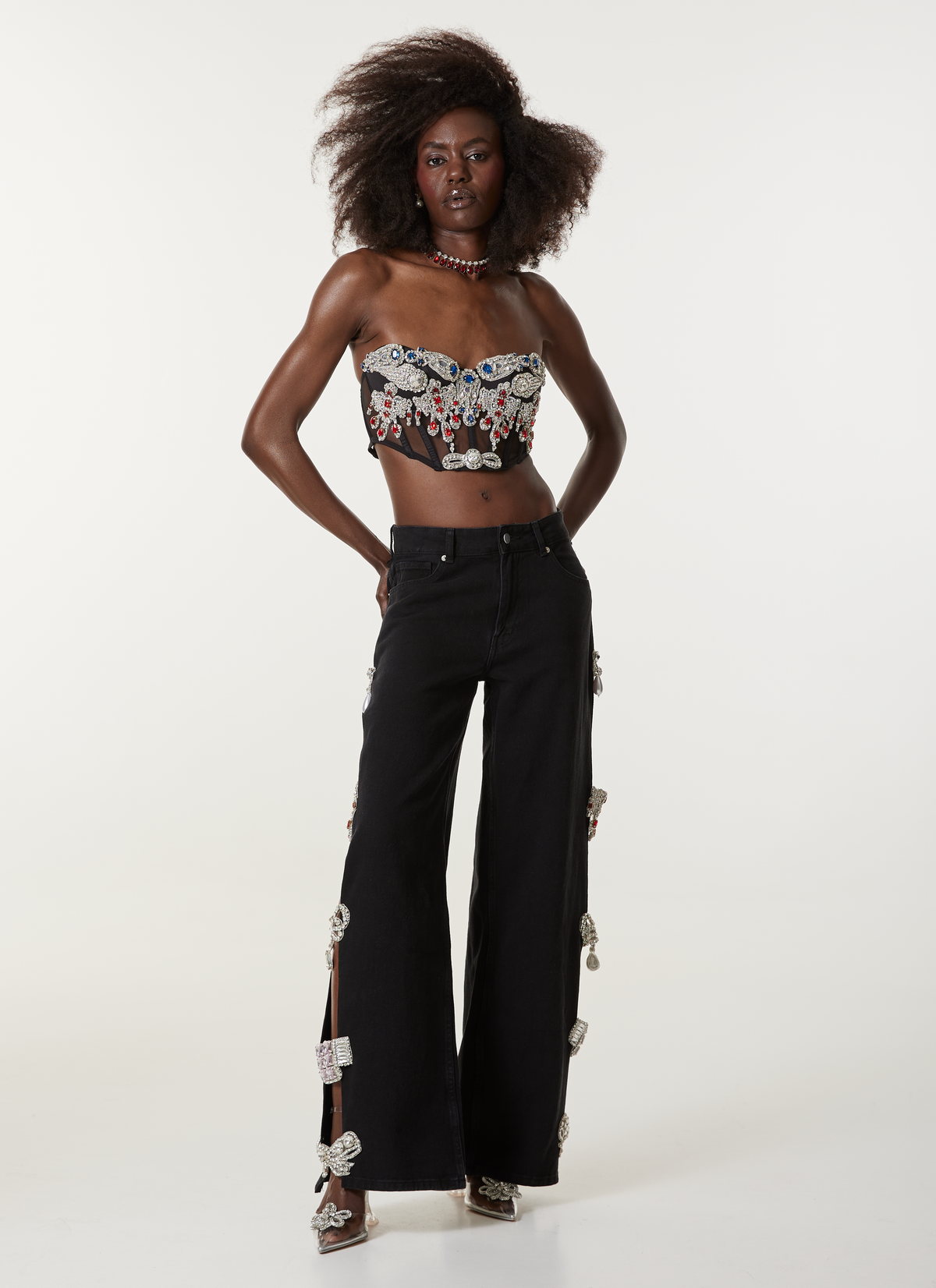 LOULOU Black Cut-Out Crystal Denim Jeans model front view with high waist, crystal embellishment and cut-out side panels.