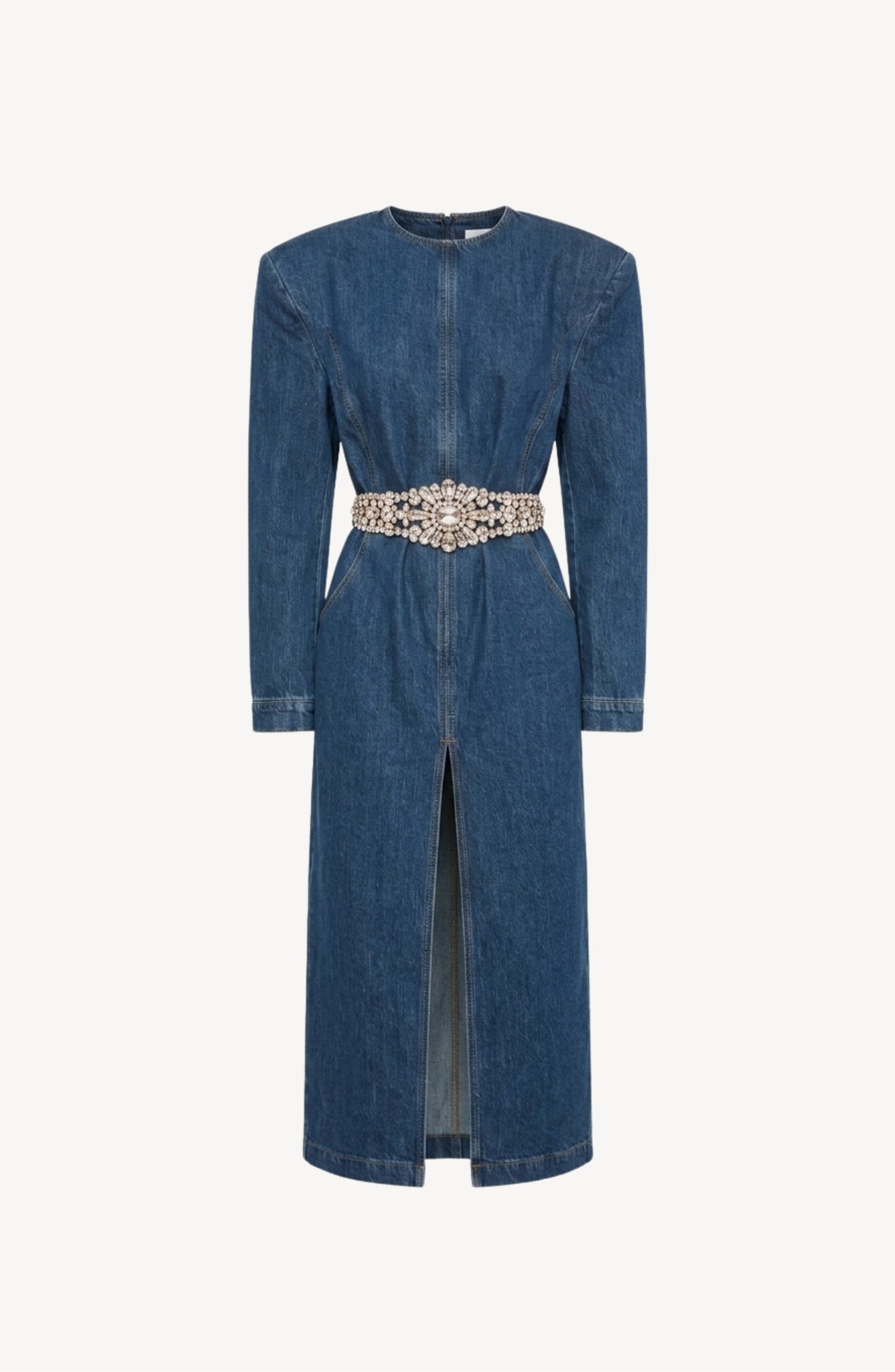 LOULOU’s Crystal Belt Denim Dress is a long-sleeved, dark indigo midi dress featuring a front slit and a fitted waist accentuated by an ornate, crystal-embellished belt.