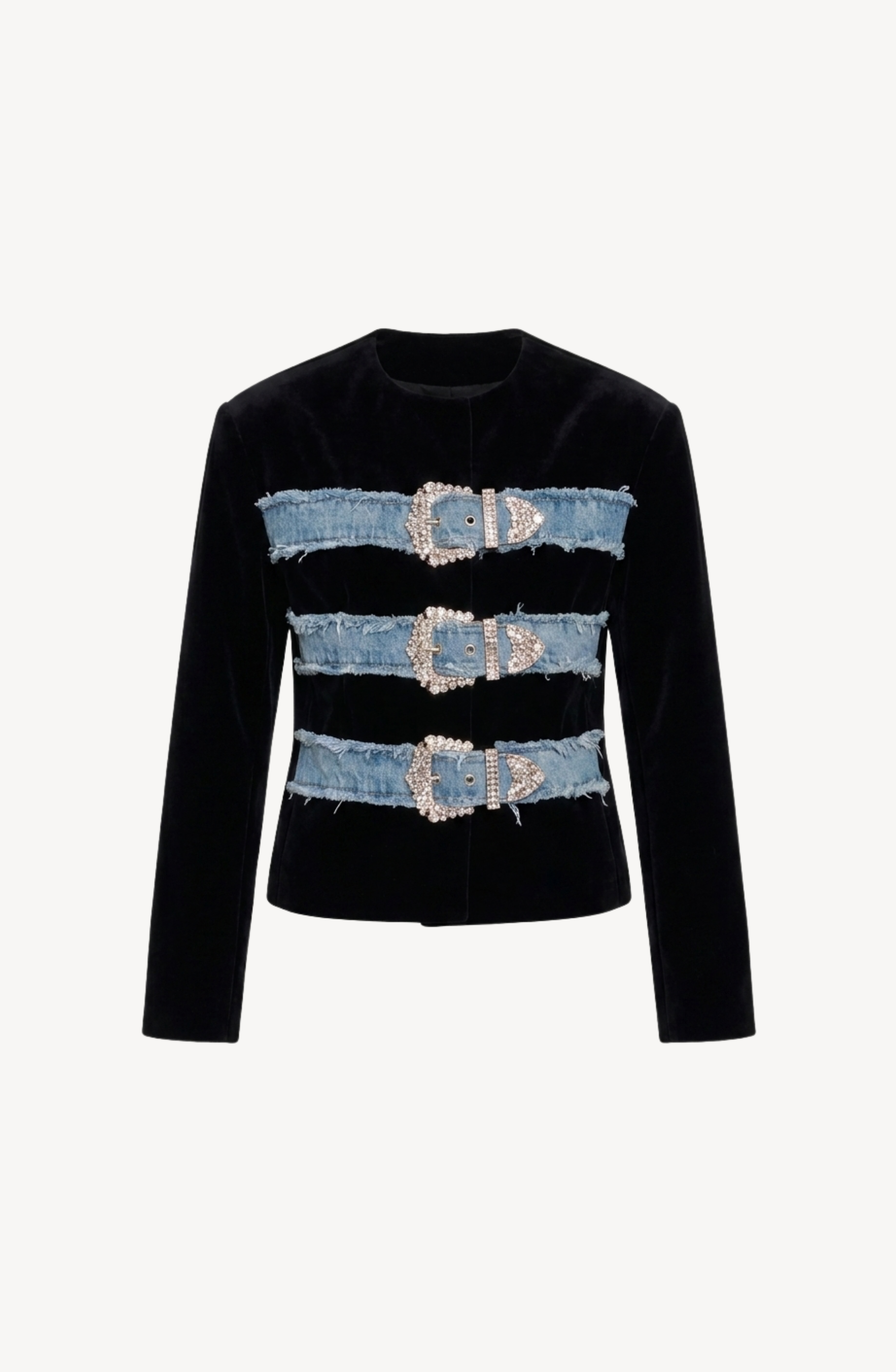 LOULOU's Crystal Buckle Velvet Jacket is a collarless black velvet design, accented with three horizontal frayed denim straps across the front, each adorned with a large, ornate, crystal-embellished buckle.