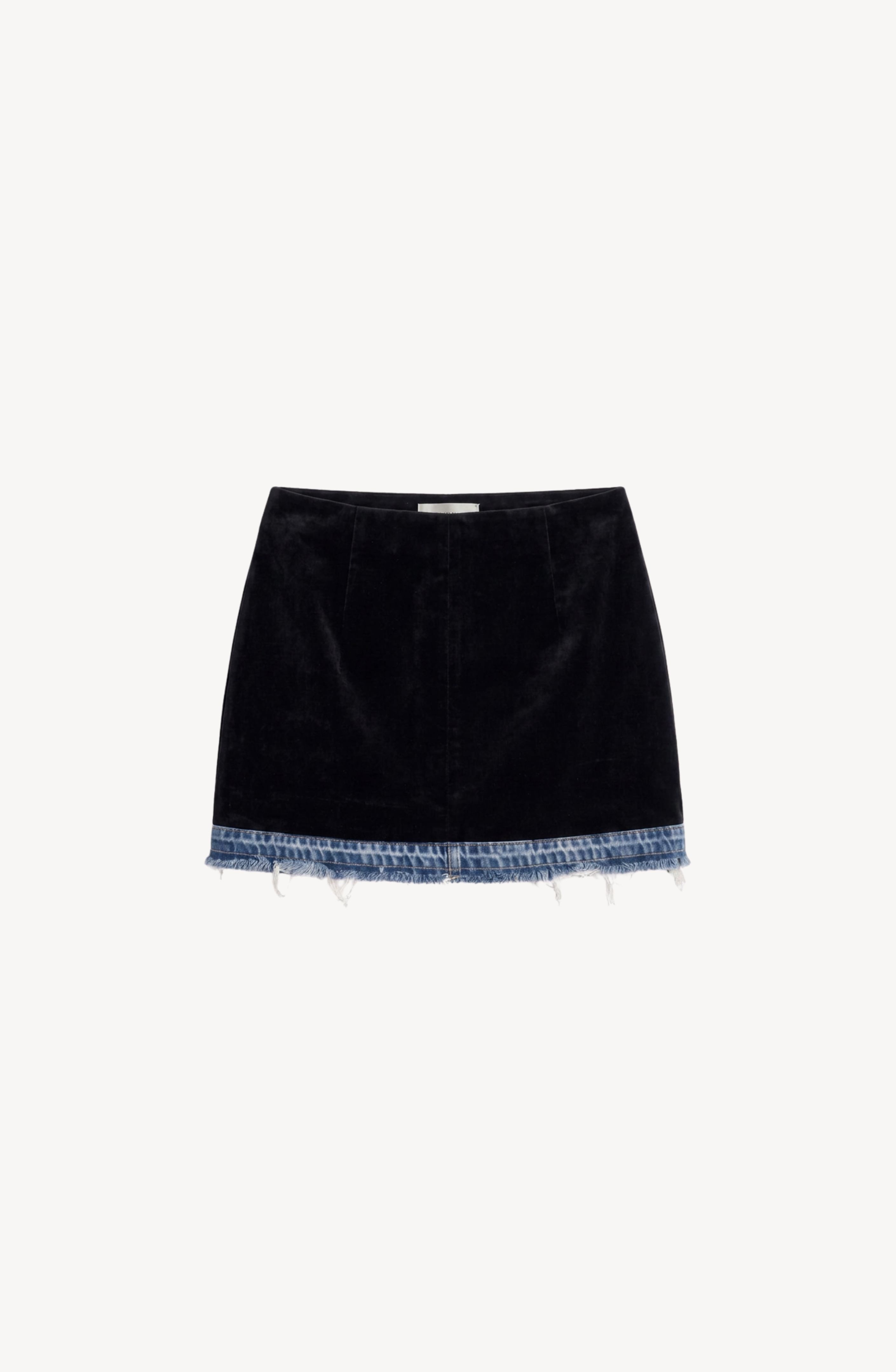 The LOULOU Velvet And Denim Mini Skirt, featuring a black velvet body and a frayed blue denim hem, is displayed on a plain white background.